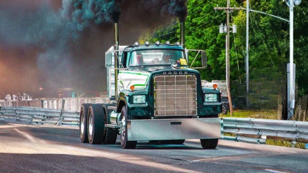Green Heavy-Duty Semi-Truck Competing in Uphill Truck Racing